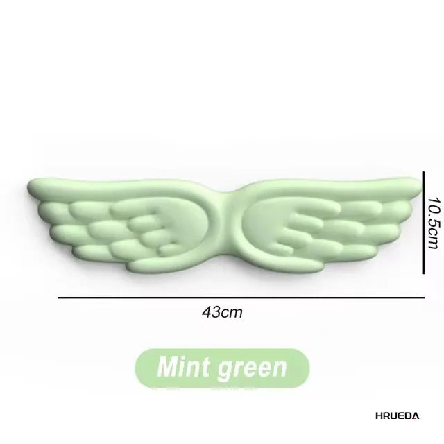 Apoio de pulso para teclado e mouse em formato de asa de anjo, feito de espuma viscoelástica. Suporte ergonômico e antiderrapante para digitação fácil em computadores e laptops.