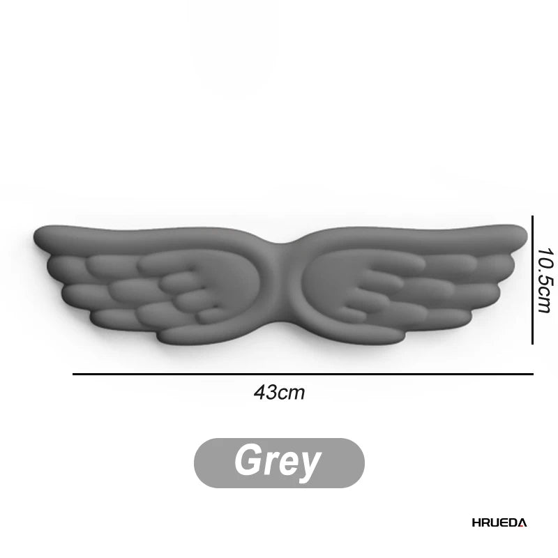Apoio de pulso para teclado e mouse em formato de asa de anjo, feito de espuma viscoelástica. Suporte ergonômico e antiderrapante para digitação fácil em computadores e laptops.